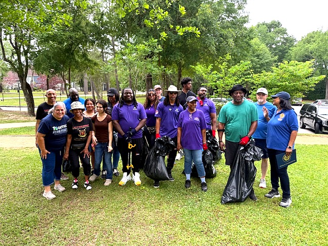 PACT volunteers gathered together after a community cleanup